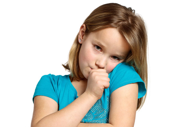 Young girl sucking her thumb